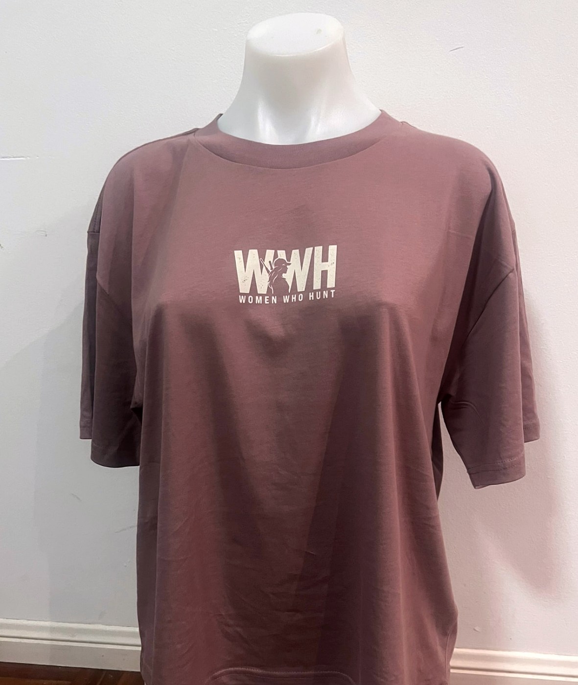 Women Who Hunt Built Different Tee in mauve, front view with WWH logo