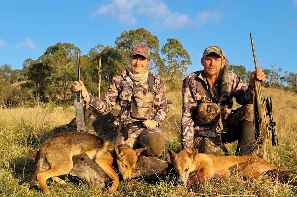 Lilly and Jordan with wild dogs they called in