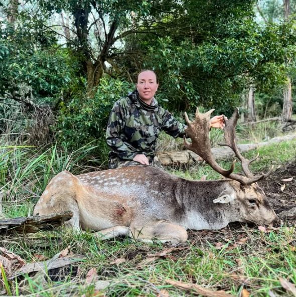 Nadine with a fallow buck