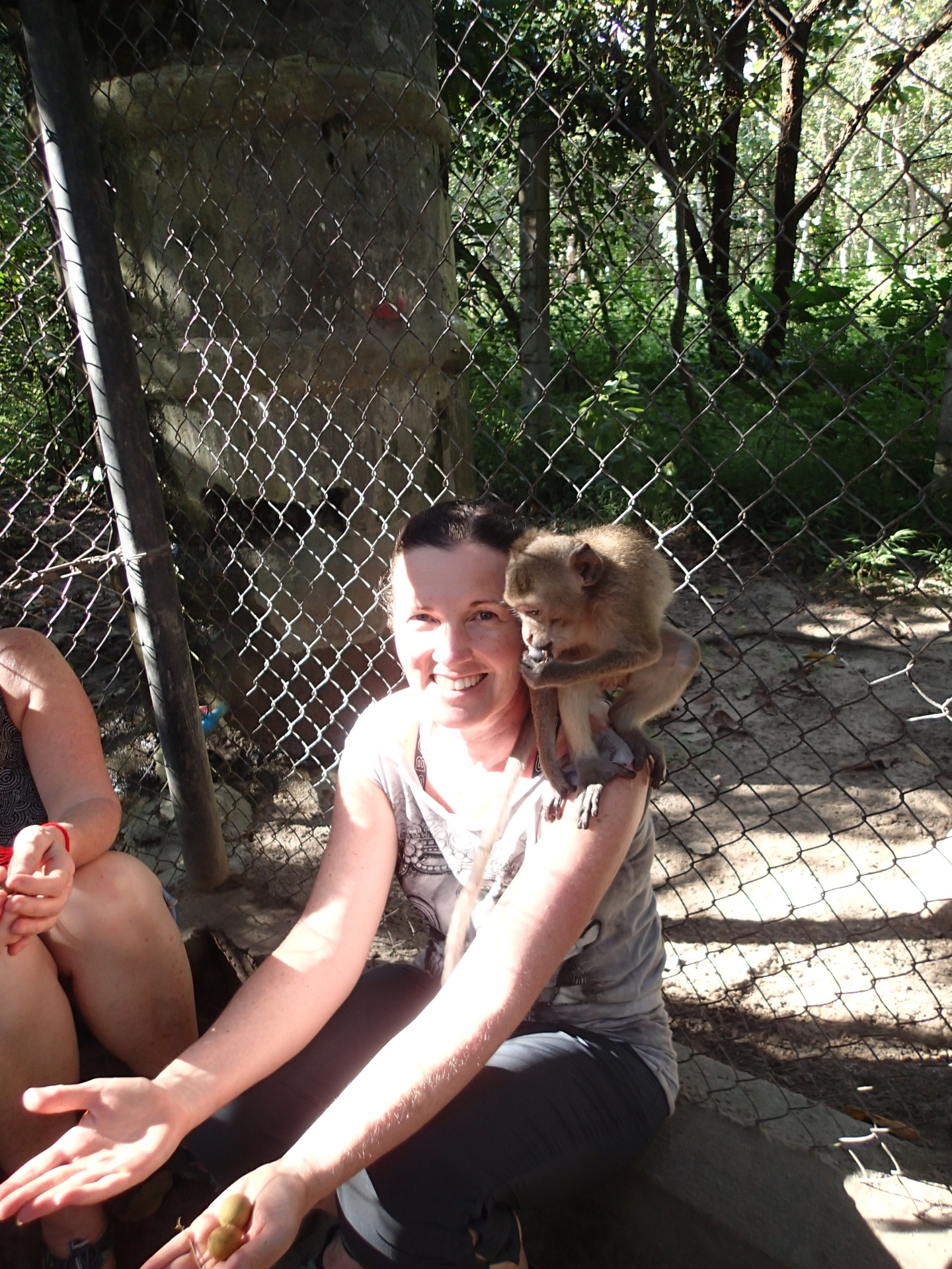 Emma with Monster the monkey in Thailand