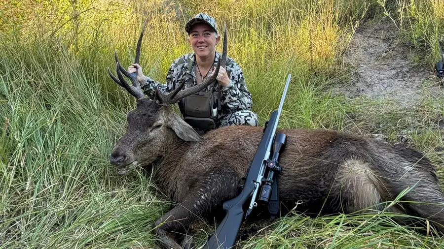 Women Who Hunt members around a campfire on a beginner course weekend