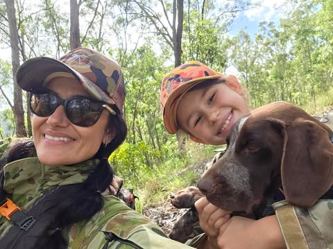 Gaby with Deanna and their hunting dog out on country